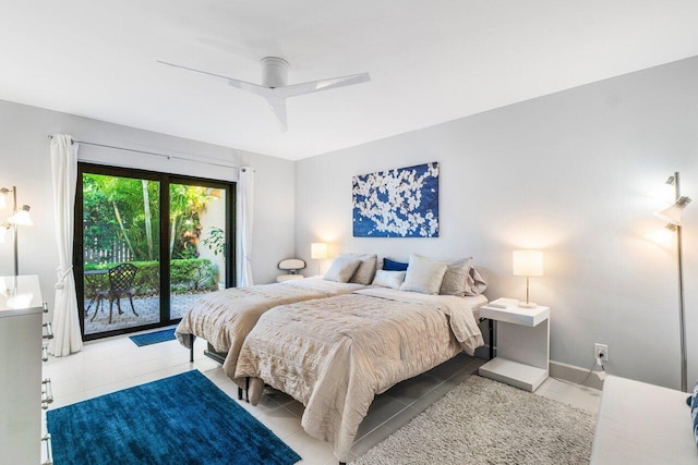 tiled bedroom featuring access to outside and ceiling fan