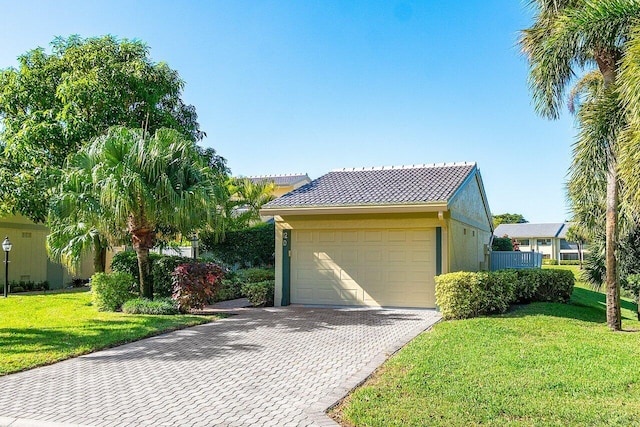 exterior space featuring a yard and a garage