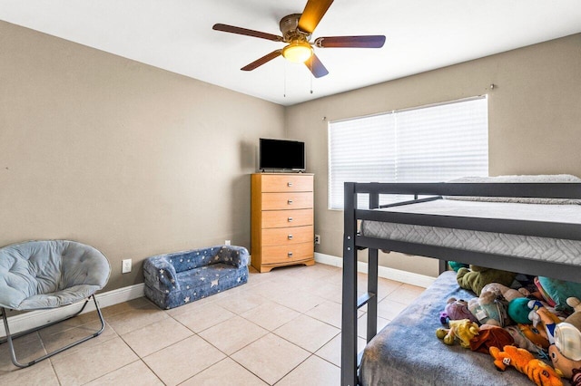 bedroom featuring ceiling fan and light tile patterned flooring