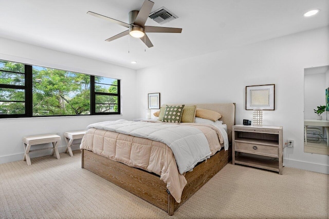 carpeted bedroom with ceiling fan