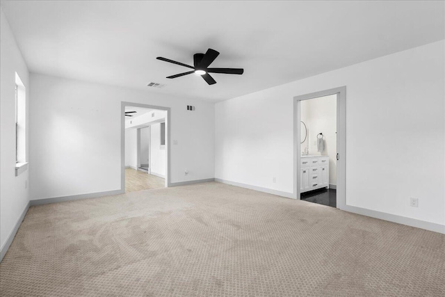 810 Bradley St, Fort Pierce, FL 34982 - empty room with carpet flooring, a ceiling fan, and baseboards