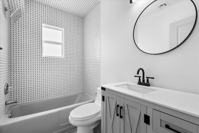 810 Bradley St, Fort Pierce, FL 34982 - bathroom featuring vanity, shower / washtub combination, and toilet