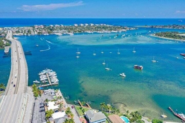 bird's eye view with a water view