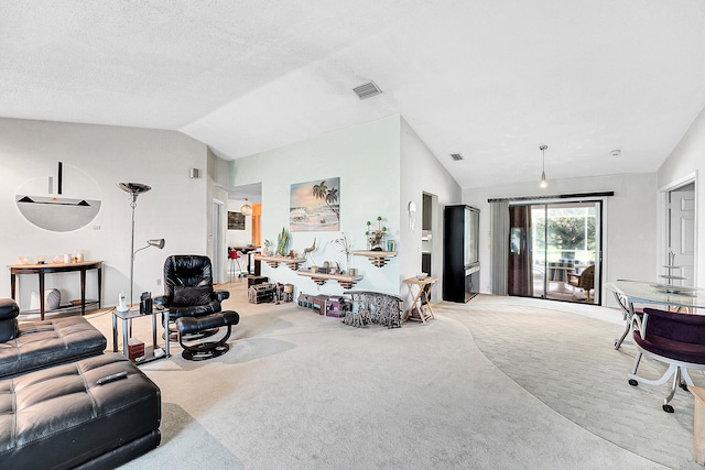 living room featuring light carpet and vaulted ceiling