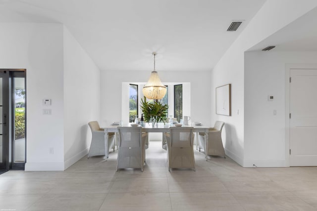 dining area with baseboards, an inviting chandelier, visible vents, and a healthy amount of sunlight