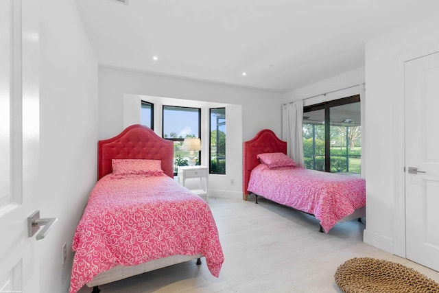 bedroom featuring recessed lighting and baseboards