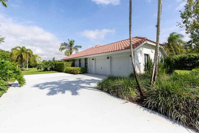 view of home's exterior with a garage