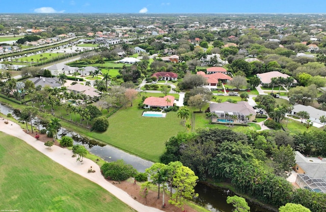 birds eye view of property with a residential view