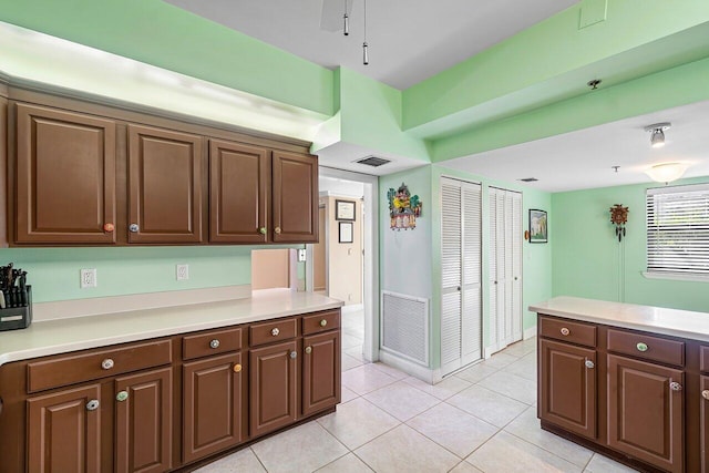 kitchen with light tile patterned floors