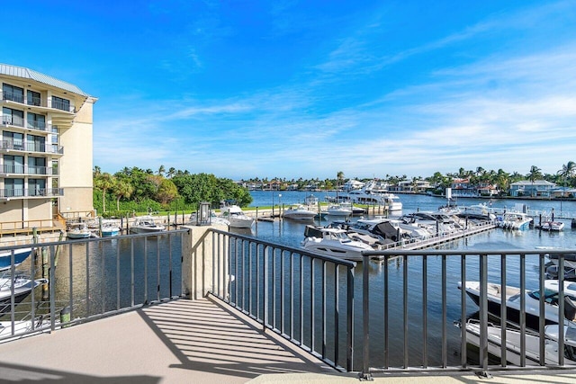 balcony featuring a water view