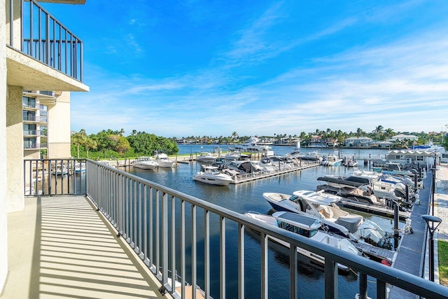 balcony featuring a water view