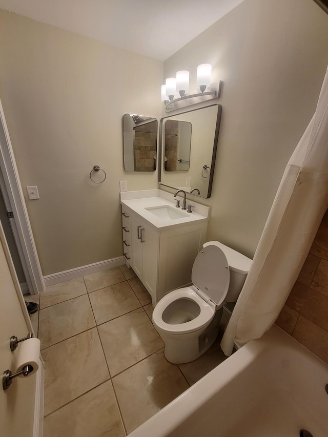 full bathroom featuring tile patterned flooring, vanity, toilet, and shower / bath combo