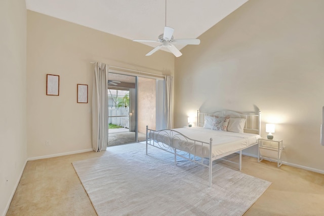 bedroom featuring light carpet, access to outside, high vaulted ceiling, and ceiling fan