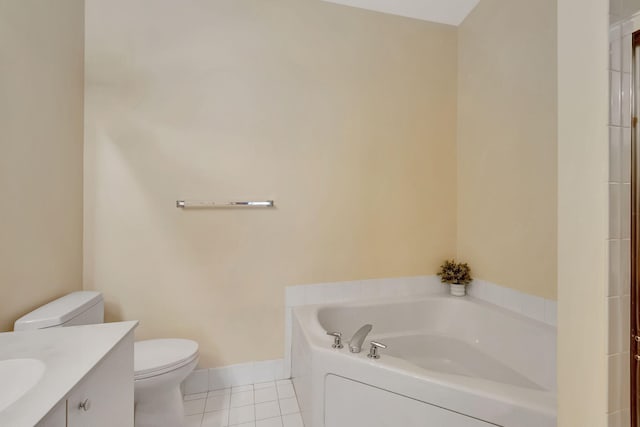 bathroom featuring tile patterned floors, vanity, toilet, and a bath