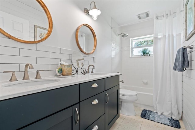 full bathroom featuring tile patterned floors, shower / bath combination with curtain, decorative backsplash, toilet, and tile walls