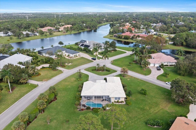 birds eye view of property featuring a water view