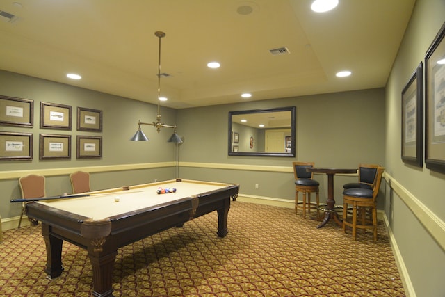 rec room featuring carpet, a tray ceiling, and pool table