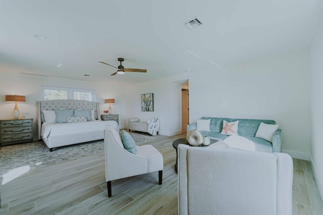 bedroom featuring ceiling fan and light hardwood / wood-style flooring