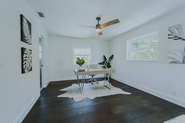 office space with ceiling fan and dark wood-type flooring