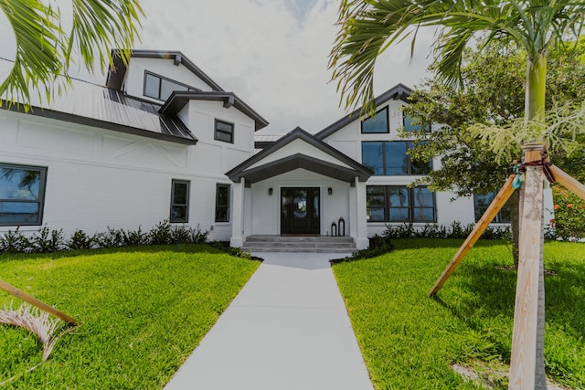 exterior space with a front yard