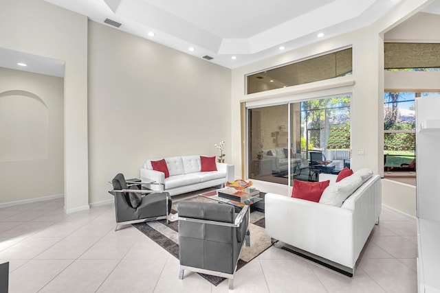 living room with light tile patterned floors