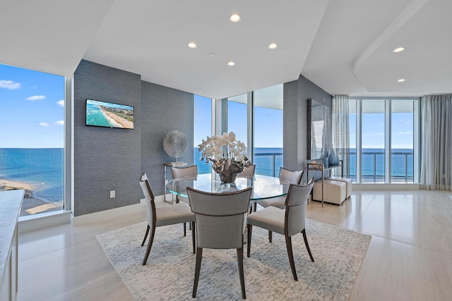 dining room with floor to ceiling windows