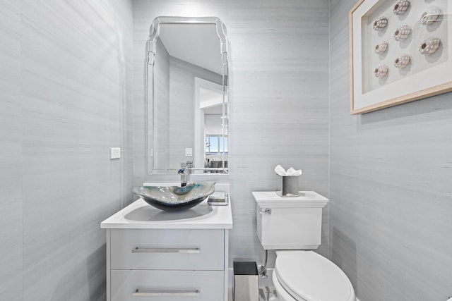 bathroom with vanity and toilet