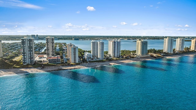 bird's eye view with a beach view and a water view