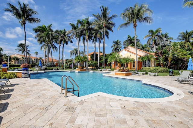 view of swimming pool featuring a patio