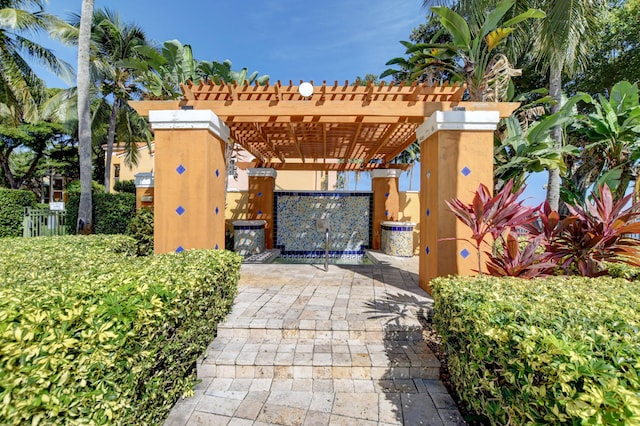 view of patio featuring a pergola