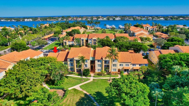 drone / aerial view with a water view