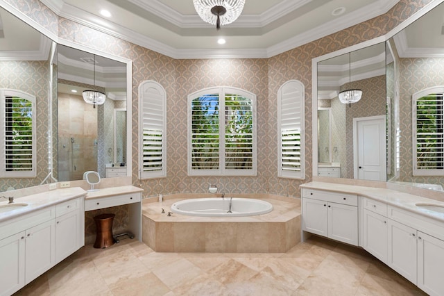 bathroom with vanity, crown molding, and plus walk in shower