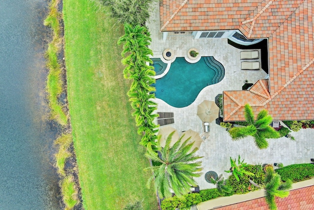 drone / aerial view featuring a water view