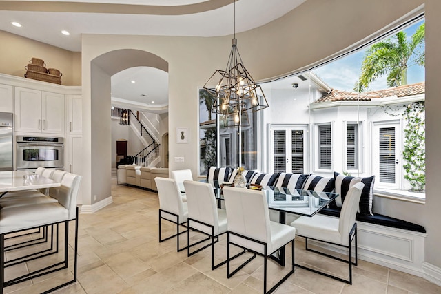 dining area featuring an inviting chandelier and a wealth of natural light