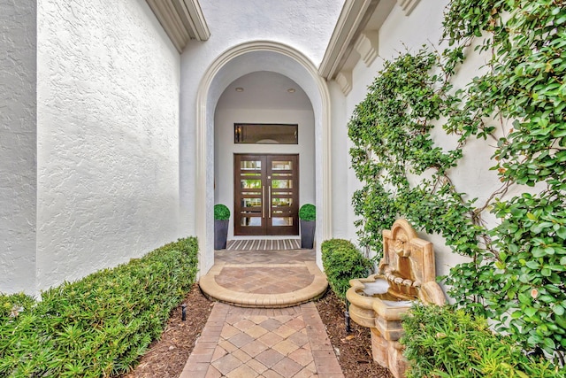 doorway to property with french doors