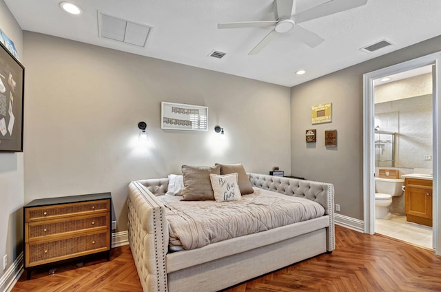 bedroom featuring parquet floors, ensuite bath, and ceiling fan