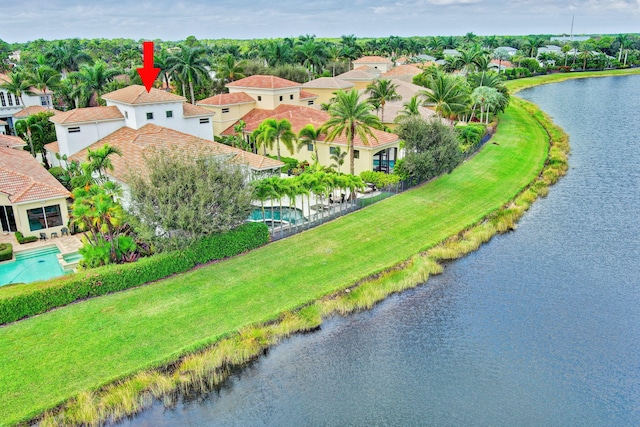 bird's eye view with a water view