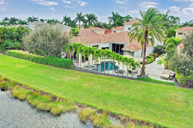 birds eye view of property featuring a water view