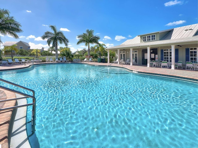 view of swimming pool featuring a patio area