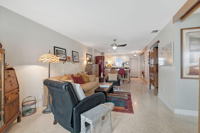 living room with ceiling fan