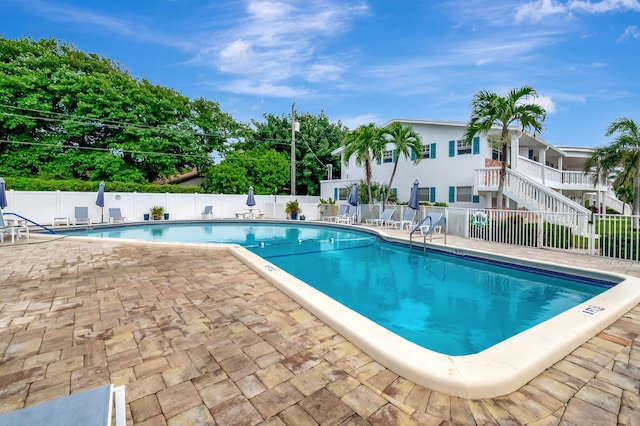 view of pool featuring a patio area