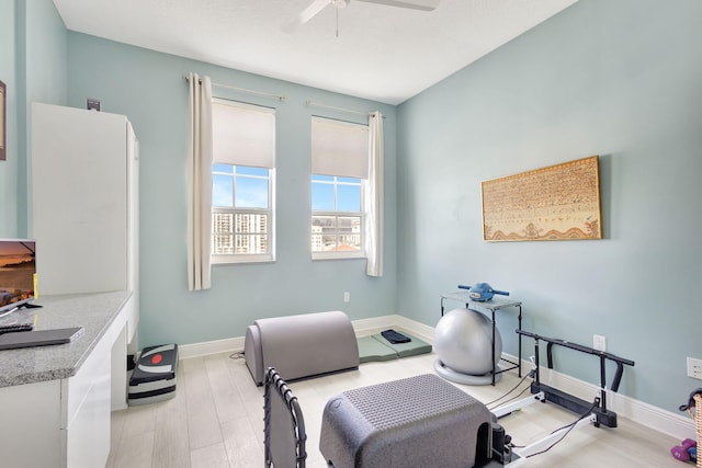 interior space featuring ceiling fan