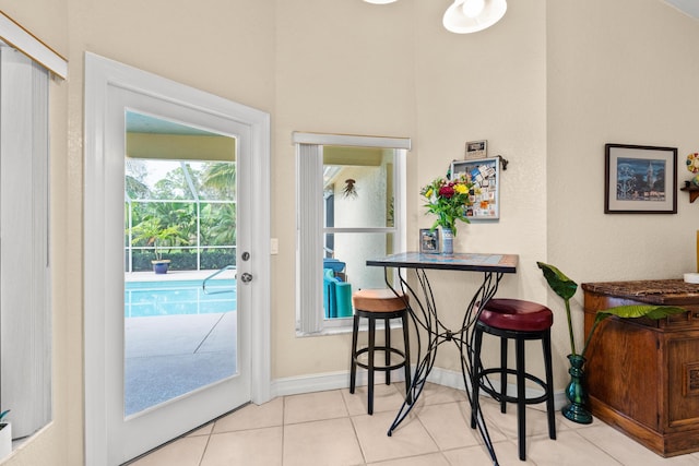 dining room featuring light tile patterned floors