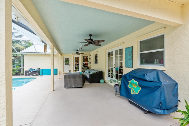 view of patio featuring a grill, ceiling fan, french doors, and an outdoor hangout area