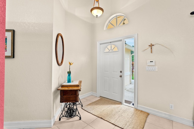 entrance foyer with light tile patterned floors