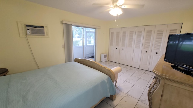 bedroom featuring ceiling fan, a closet, and a wall mounted AC