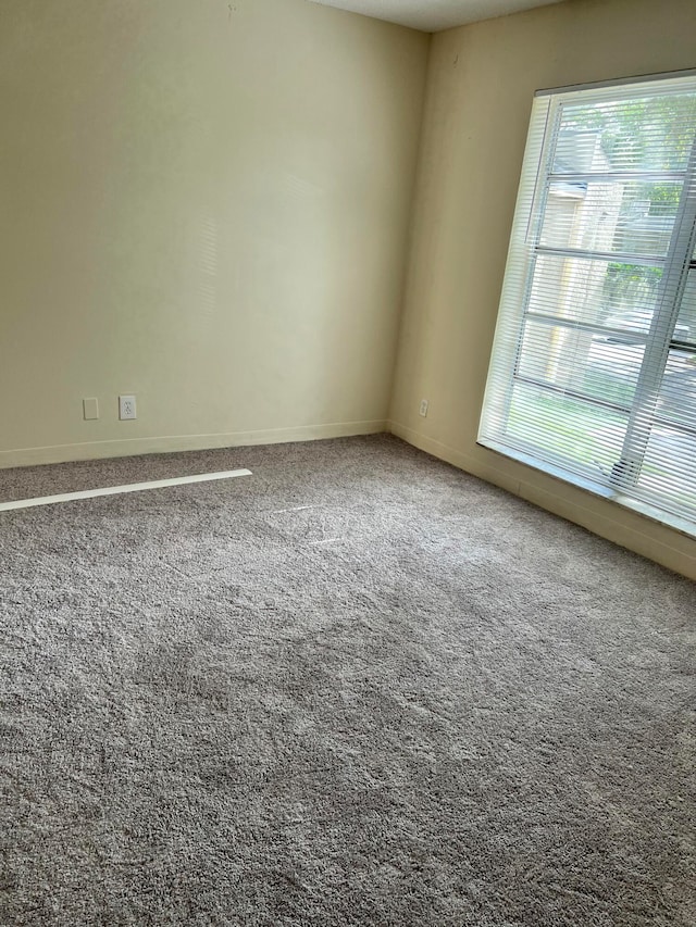 view of carpeted spare room