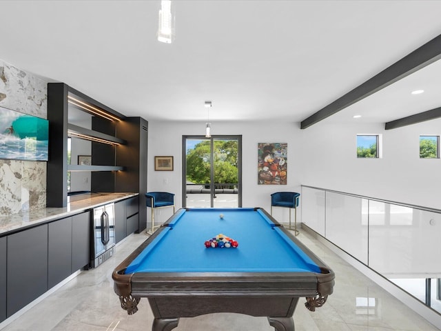 game room featuring beverage cooler, beam ceiling, a healthy amount of sunlight, and recessed lighting