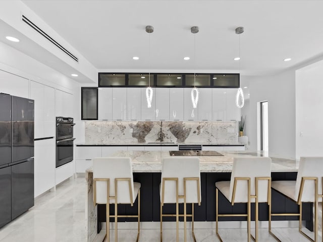 kitchen with decorative backsplash, white cabinets, black appliances, and modern cabinets