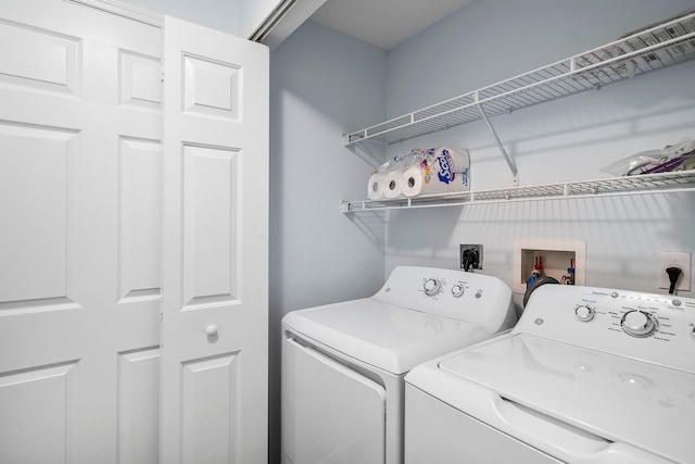 laundry area featuring washer and clothes dryer